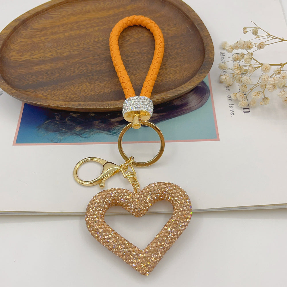 
                      
                        Leather Rope Hollow Heart Bags Pendant
                      
                    