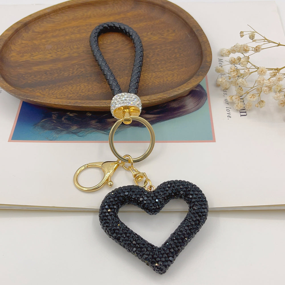 
                      
                        Leather Rope Hollow Heart Bags Pendant
                      
                    