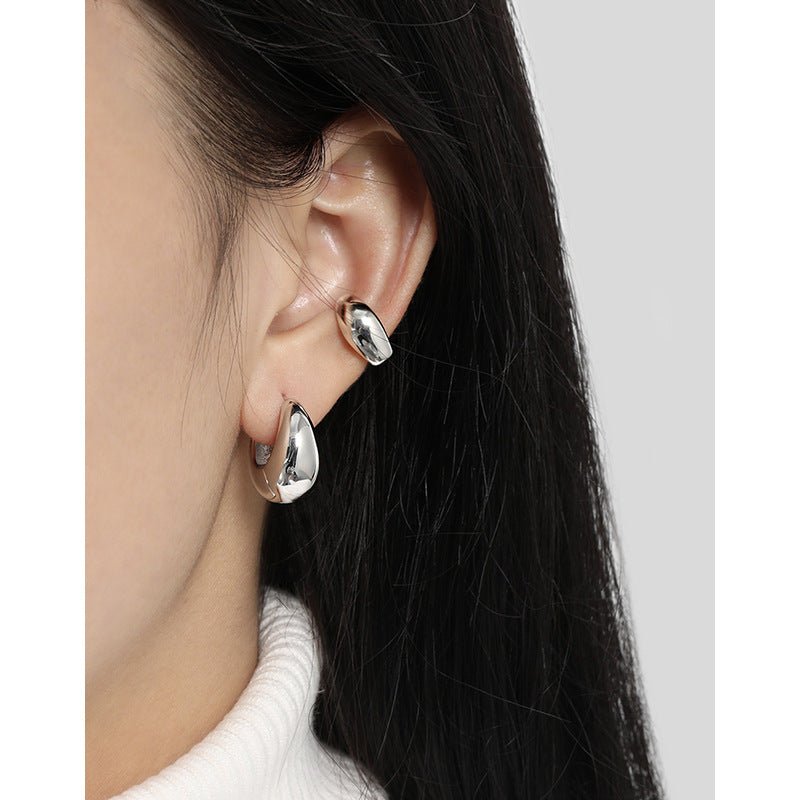 
                      
                        French retro cool and niche design, simple and versatile temperament, curved S925 sterling silver earrings and earrings
                      
                    